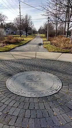 1st Avenue entry to Illinois Prairie Path with Maywood logo