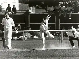 Richard Hadlee bowling. Botham at non-strikers end, Wellington