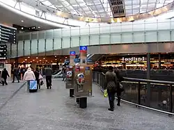 The Airport Centre at-grade level, one level above the station's offices and ticketing machines, and two levels above the tracks