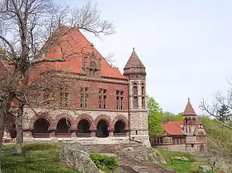 Oakes Ames Memorial Hall with Ames Free Library in background.